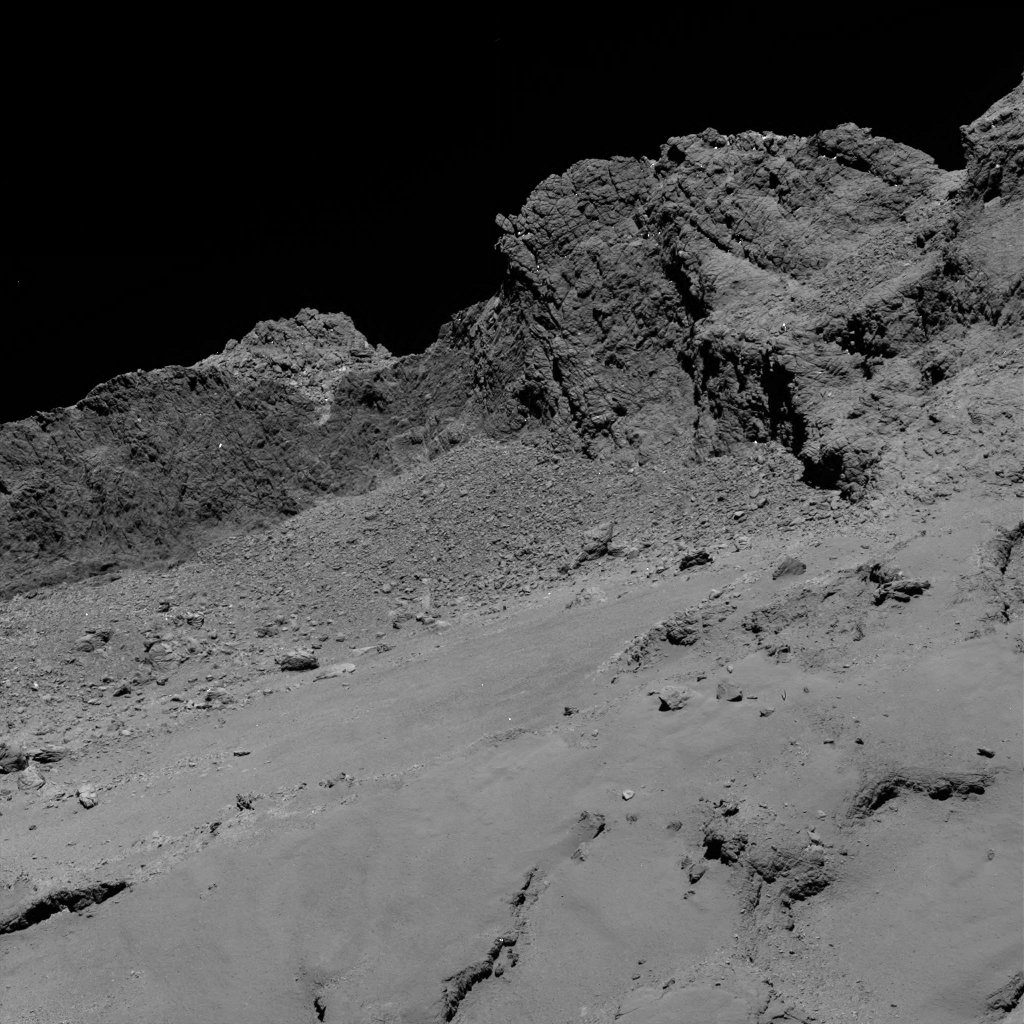Das Bild entstand beim kontrollierten Absturz der Raumsonde Rosetta. Es zeigt die Oberfläche des Kometen Tschurjumow-Gerassimenko aus einer Höhe von 16 Kilometern.