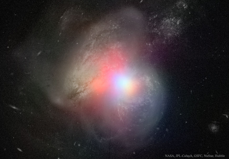 In sichtbarem Licht sieht man zwei verworrene Galaxien, darüber ist Röntgenlicht in Falschfarben gelegt. Es zeigt das Gerangel der Schwarzen Löcher.